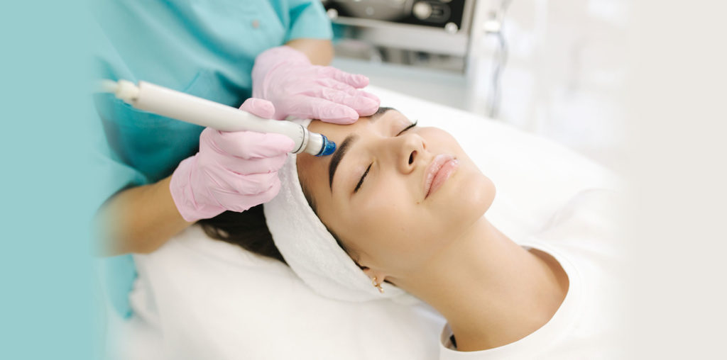 Woman receiving skin resurfacing treatments at Vitalyc