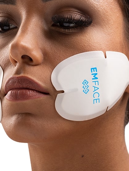 Woman with EmFace applicator